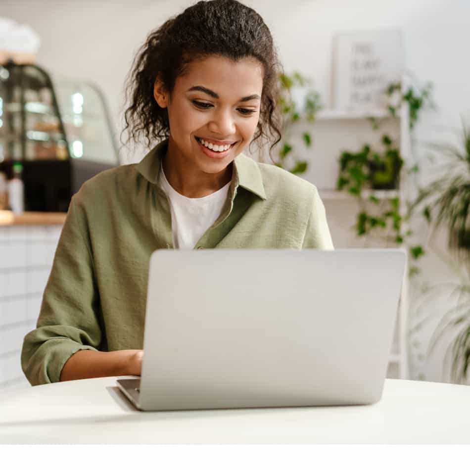 Young woman using laptop.